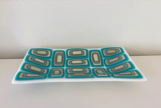 Layered turquoise, grey, vanilla on white