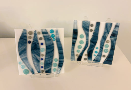 Pair of blue tiles on white